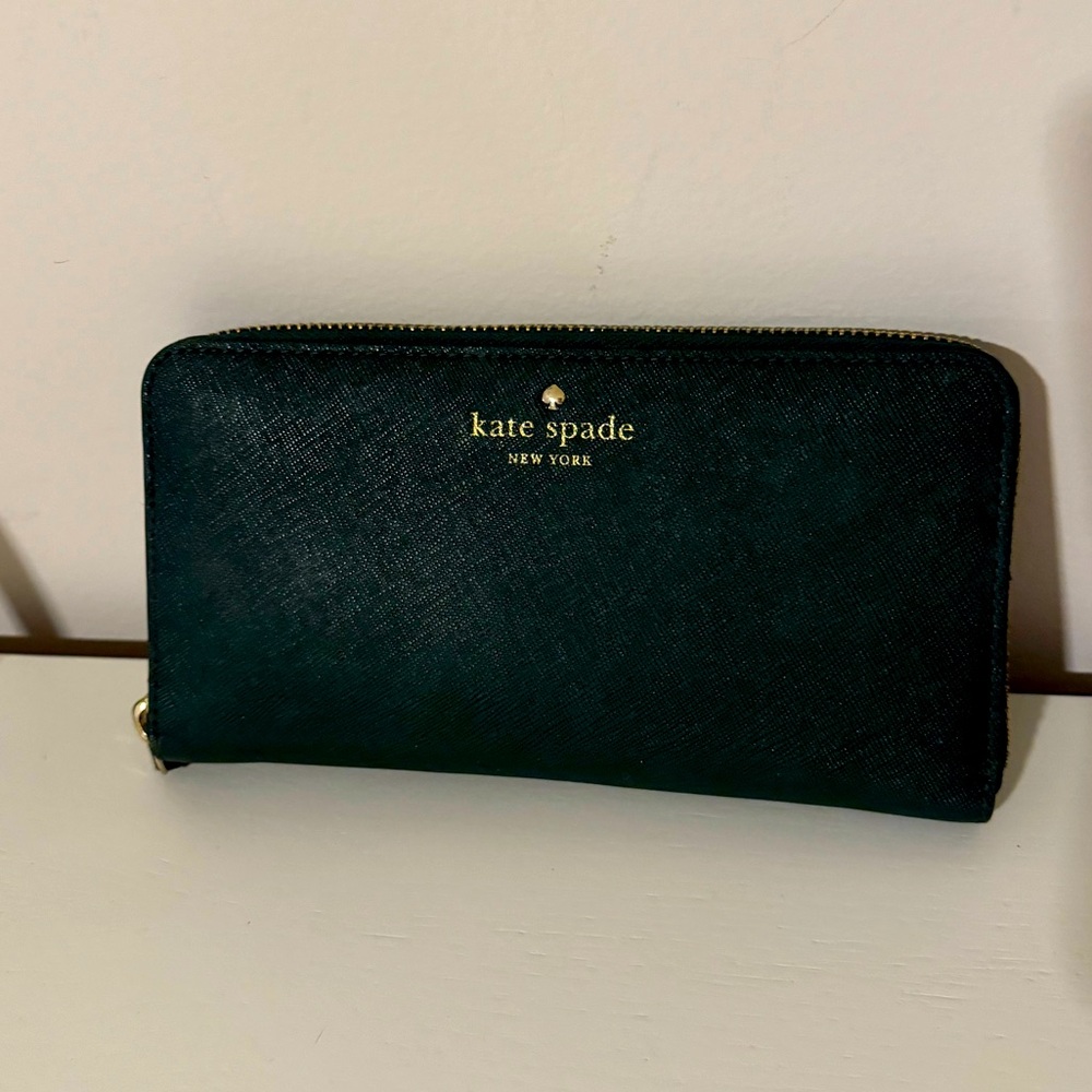 Kate spade green wallet with polka dot design inside